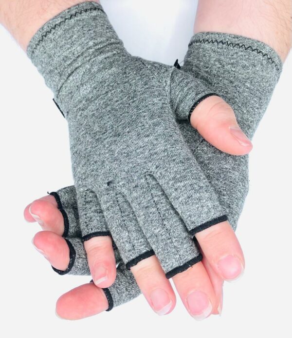 Close up image of grey IMAK Arthritis gloves Australia being worn.