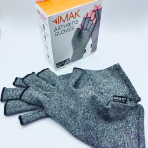 One pair of IMAK Arthritis gloves in colour grey, in front of the product box.