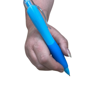 Large grip pen being held in a right hand